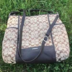 Authentic Coach bag with Coach signature print.